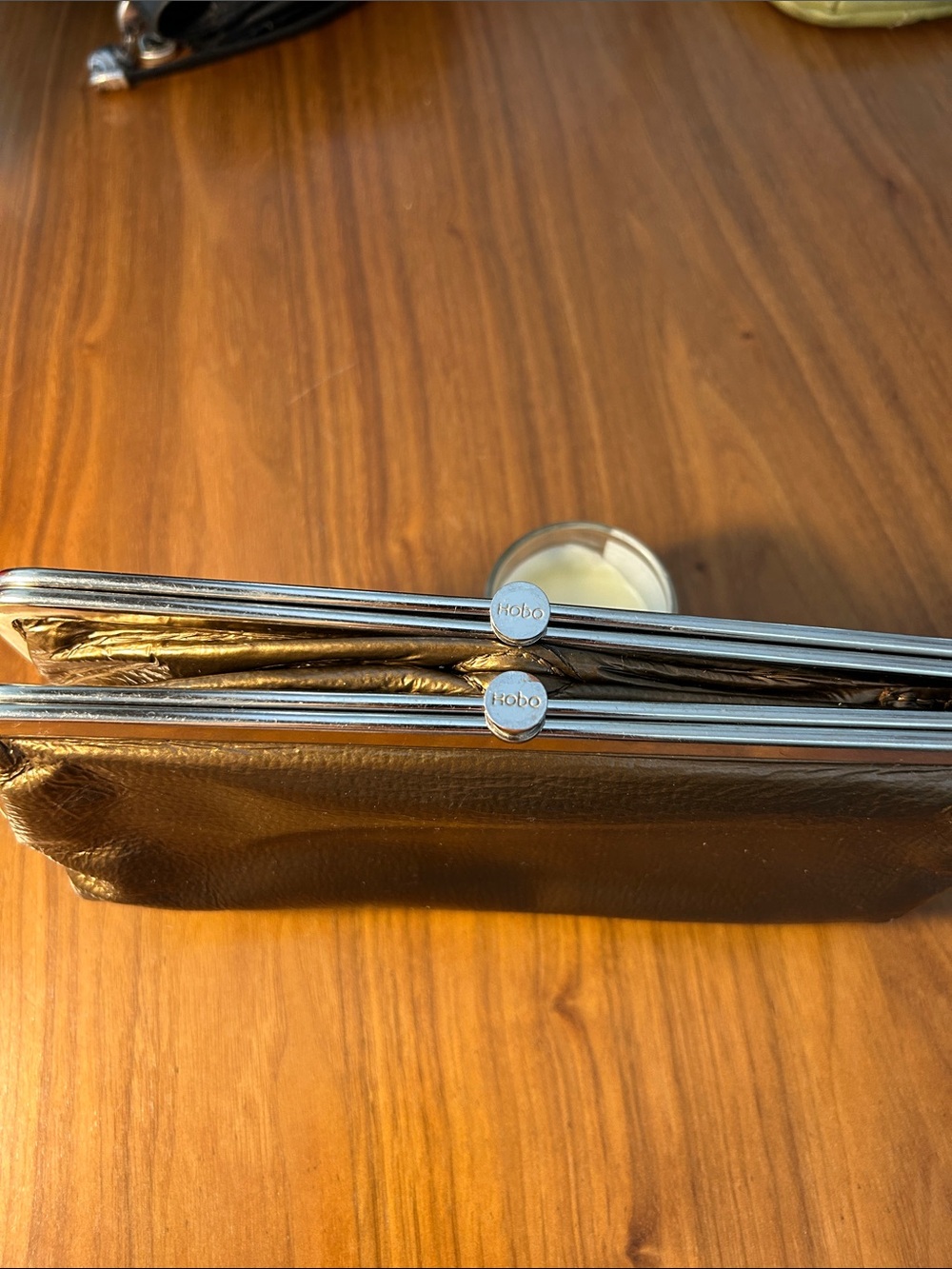 HOBO Metallic Bronze Leather Frame Wristlet Clutch